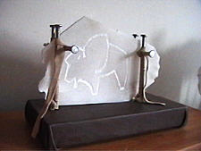 Alabaster, Leather, and Findings sculpture of a buffalo