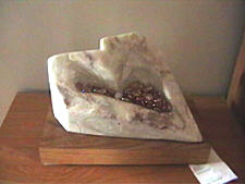 Alabaster sculture on a oak base