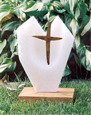 Alabaster sculture on a oak base with a copper cross